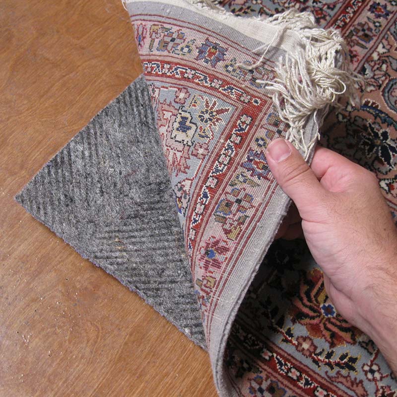 Oriental area rug protected by rug pad by AmeriClean Cleaning Specialists.