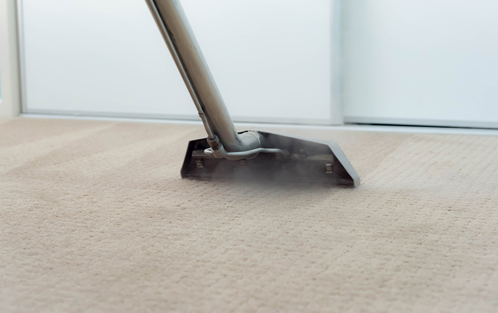 Steam cleaning carpet