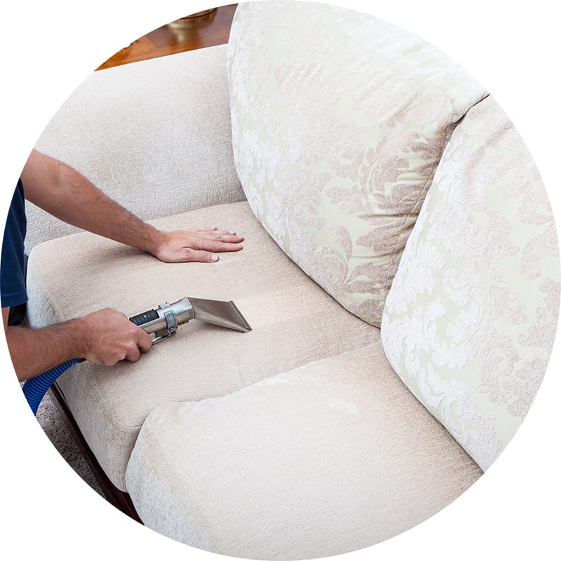 A white sofa gets deep cleaned by our upholstery cleaning experts at AmeriClean Cleaning Specialists